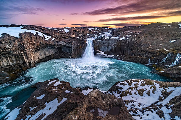 Dramatic sky aerial wide angle drone view of Iceland Aldeyjarfoss waterfall