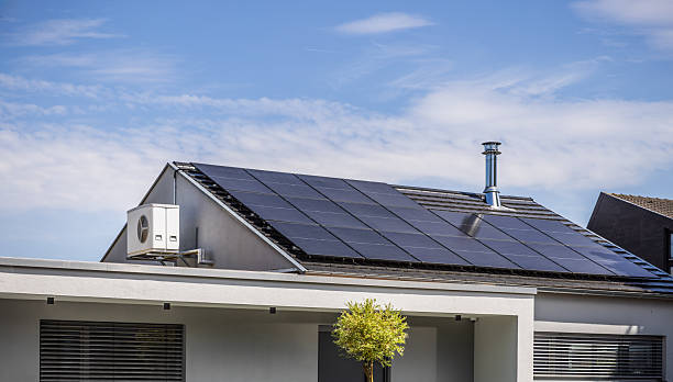 istock Roof of modern house with inverter split system and installed solar panels 2246156321
