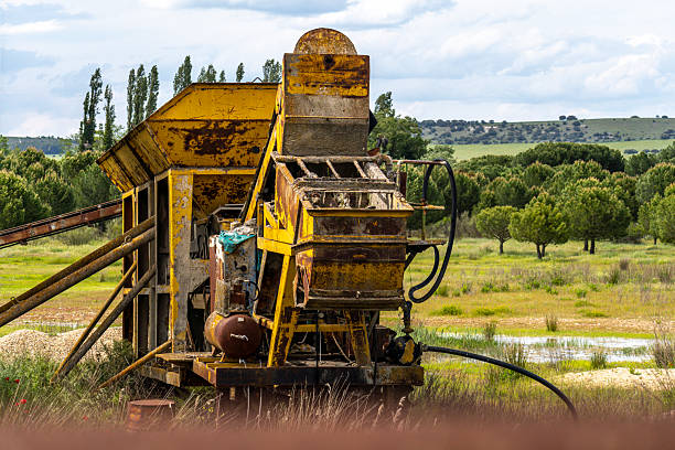 Old sand and quarry stone grinding plant. Quarry equipment.