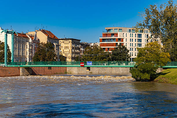 Wroclaw, Poland - September 20 2024: Flood status in Wroclaw, showing emergency preparations, sandbags protecting monuments, and the dramatically high water levels of the Odra River