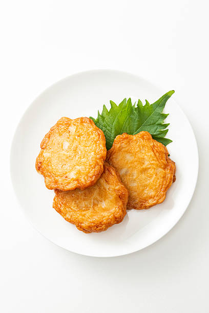 istock Satsumaage on a plate on a white background 2246169778