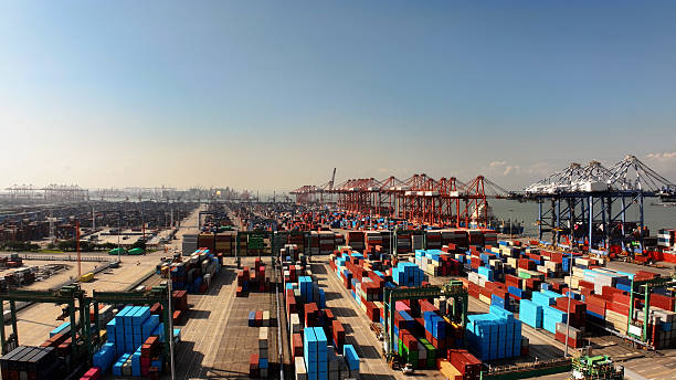 istock Lot big boxes rows, ship delivery ocean harbor. Cargo containers seaport freight 2246170049