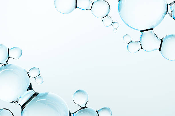 istock Abstract 3D background with transparent blue molecule, liquid water drops. Beauty and cosmetic composition symbolizing purity, freshness, science, and molecular structure. Text place. 2246170192
