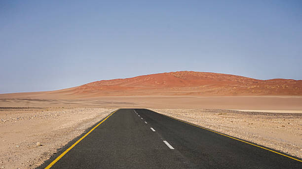 istock Desert road between sand dunes at Sossusvlei 2246177228