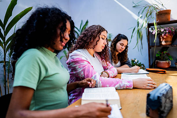 istock Friends studying together at home 2246179354