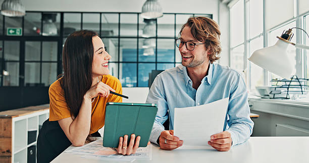 istock Team, document or people in office with tablet, partnership or review of financial statement. Happy, audit paper or analyst in agency with tech, collaboration or data check in budget management. 2246184411