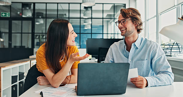 istock Smile, document or people in office with laptop, conversation and teamwork for financial statement. Happy, audit paper or analyst in agency with tech, collaboration and data entry on online app. 2246184423