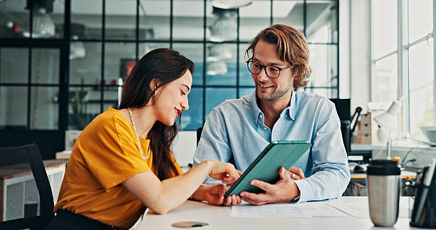 istock Browsing, online and people with tablet, office and happy for ad performance on website and talking. Digital marketing, man and woman with tech for campaign, smile and teamwork for brand awareness 2246184463