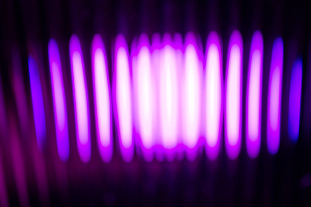 An abstract, vibrant purple light source creating vertical, rhythmic streaks on a dark, mysterious background.