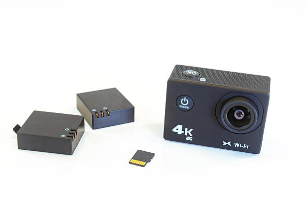 istock 4k action camera with two batteries and a memory card 2246186197