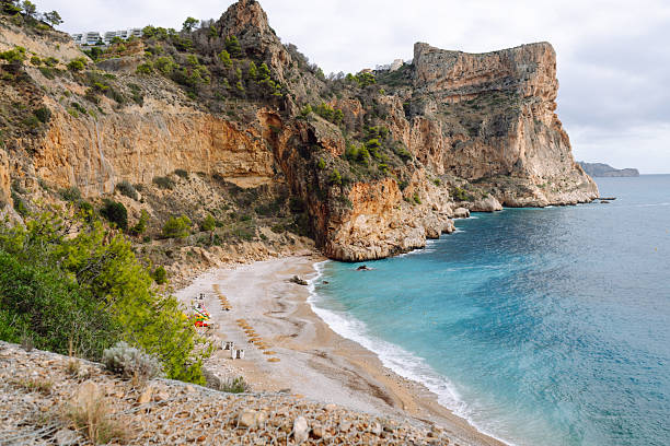istock Seascape. Rocky cliffs with calm turquoise waters. 2246186941