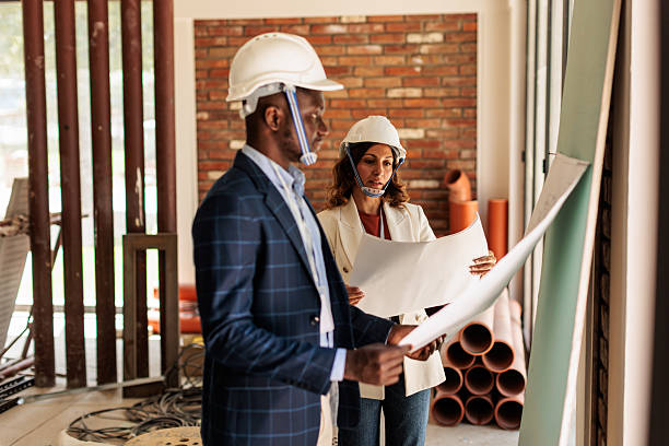 istock Architects Discussing Building Plans Indoors 2246189288