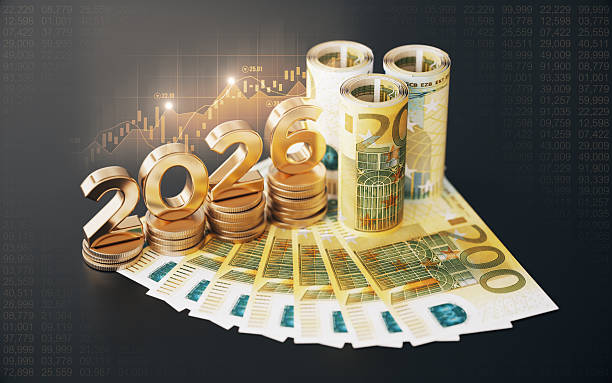 Gold Colored 2026 Text and Coin Stack with 200 Euro Banknotes, Financial Bar Graph on Black Background.