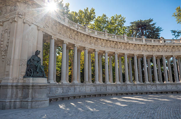 istock Statuary and colonnade at El Retiro Park in Madrid 2246193477