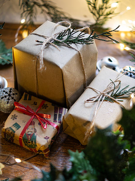 istock Rustic Christmas Gifts and Bells on Wood 2246196886