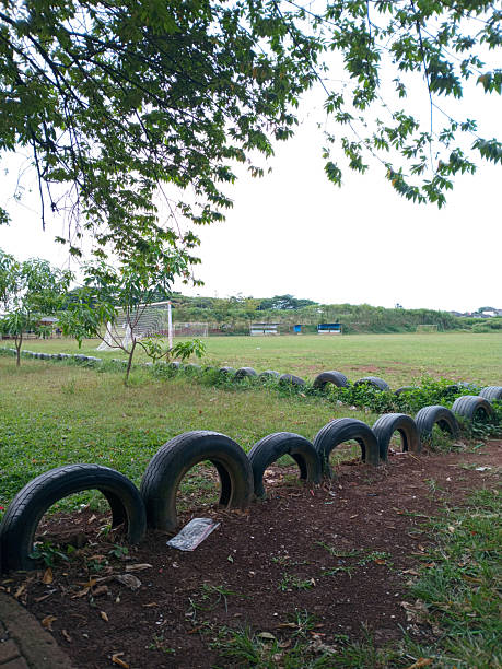 istock Soccer Field with Tire Border 2246198707