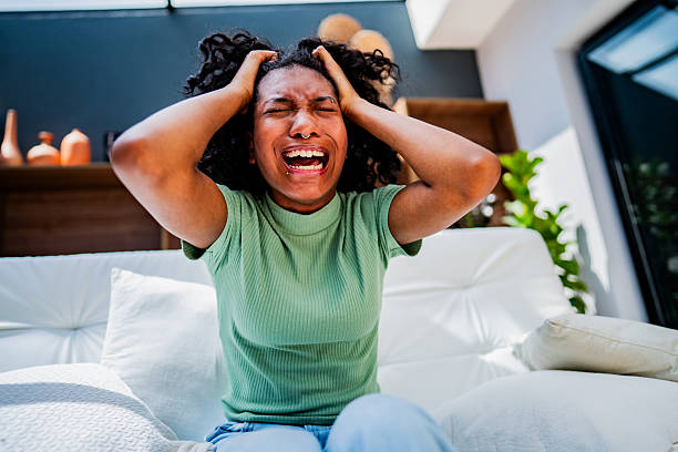 istock Anger young woman at home 2246200301