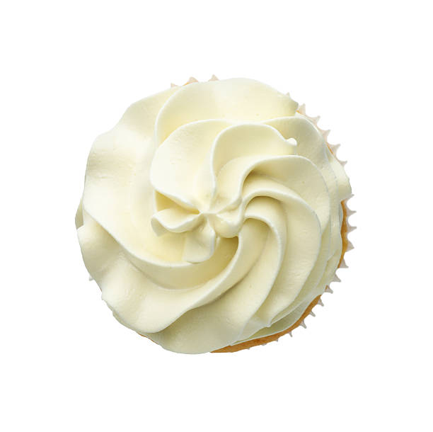 istock Tasty vanilla cupcake with cream isolated on white, top view 2246201318