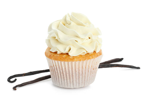 istock Tasty cupcake with cream and vanilla pods isolated on white 2246201728