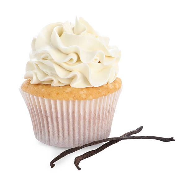 istock Tasty cupcake with cream and vanilla pods isolated on white 2246201730