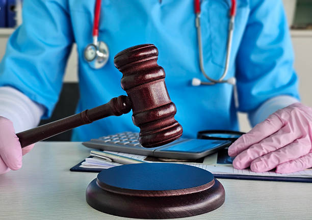 istock Judge gavel, forensic doctor, medical diagnosis 2246202186