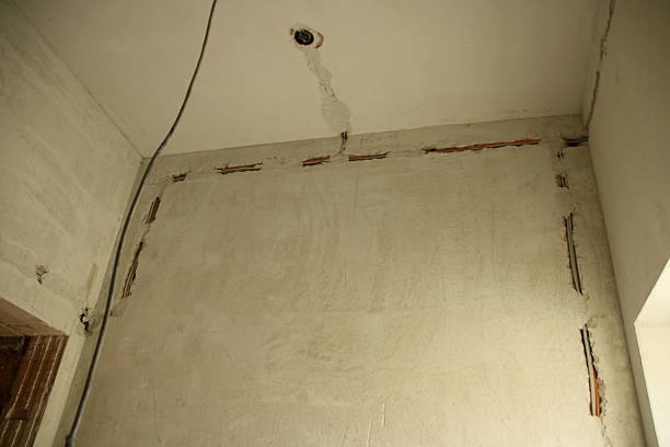 istock New electrical cables were installed in a wall of the room. 2246206698
