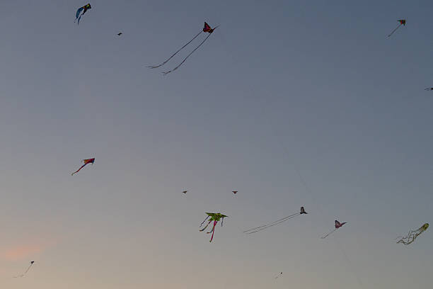 istock Colorful kites soaring in the evening sky over Tempelhof, Germany 2246207011