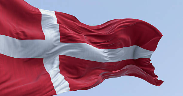 istock Denmark national flag waving on a clear day 2246210281