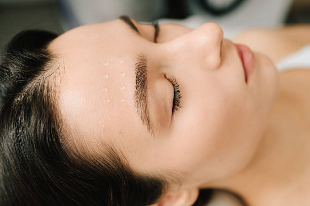 istock Cosmetologist performs injection biorevitalization using hyaluronic acid to restore skin hydration. Hyaluronic biorevitalization to enhance epidermal moisture and collagen synthesis. 2246211029