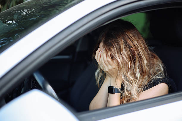 istock Stressed woman drive car feeling sad and angry. 2246213107