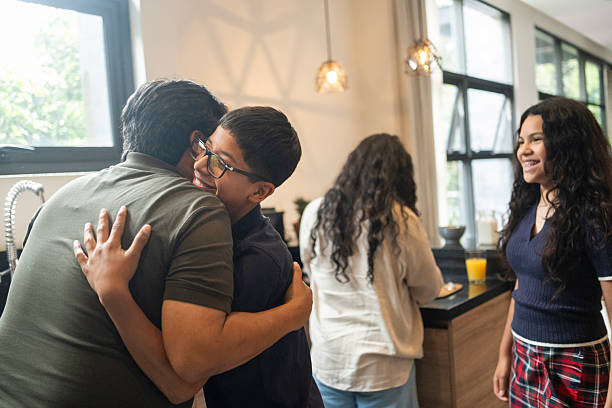 istock Parents saying goodbye to their children who are going to school 2246213402
