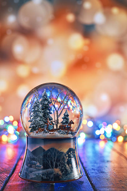 istock Christmas Decoration with Snow Globe and Holiday Lights 2246220668