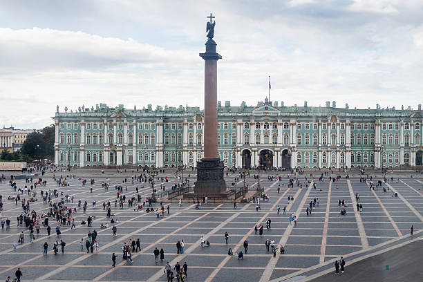 Saint Petersburg, Russia - August 23, 2025: view of Palace square with Alexander Column and Winter Palace from General Staff Building in St Petersburg city on overcast summer day