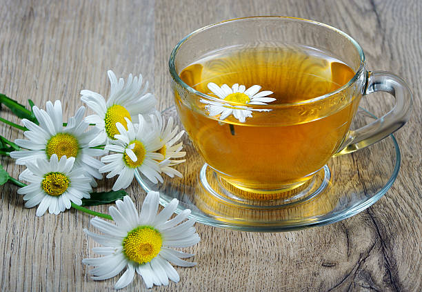 istock cup of chamomile tea on a wooden table 2246227975