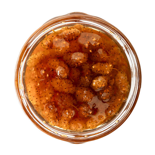 istock top view of open glass jar with white mulberry jam 2246230219