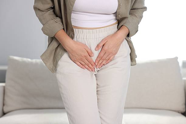istock Woman suffering from cystitis symptoms at home, closeup 2246233593