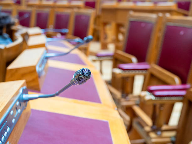 istock microphones at working places in conference hall 2246234628
