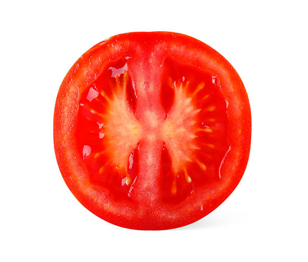 istock Piece of ripe red tomato isolated on white 2246237437