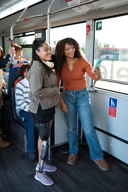 istock Diverse friends taking selfie on public transport 2246237593