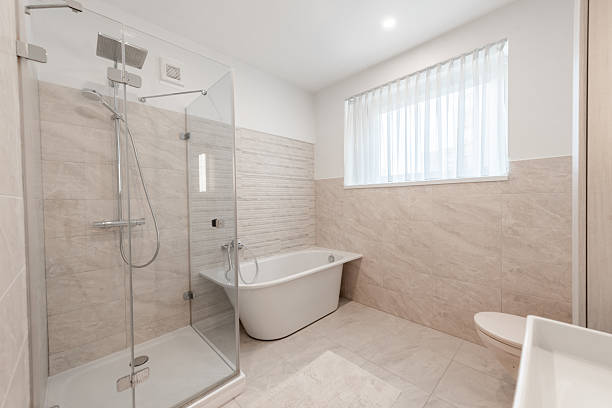 istock Modern Home Minimalist Bathroom With Stylish Decor and White Fixtures 2246239919