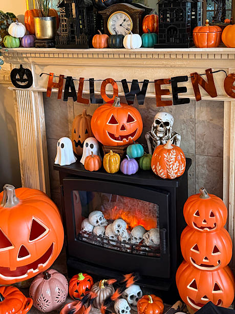 istock Image of spooky halloween decorations on fireplace featuring pumpkins, glowing jack-o’-lanterns, creepy skulls, and ghostly accents 2246244234