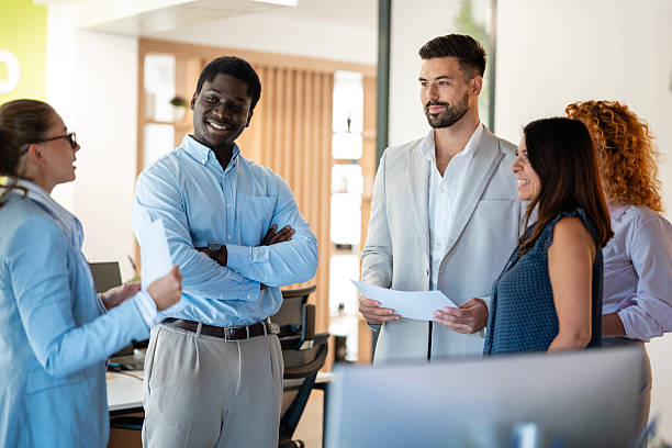 istock Diverse business team brainstorming ideas in modern office 2246249043