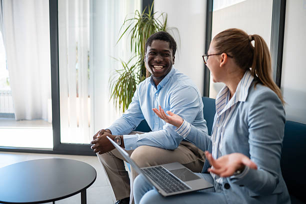 istock Smiling business professionals having productive discussion 2246249101