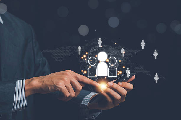 istock Know your customer (KYC) concept, Target customer, Magnifier glass focus to manager icon which is among staff icons for human development recruitment leadership and customer target group concept. 2246250613