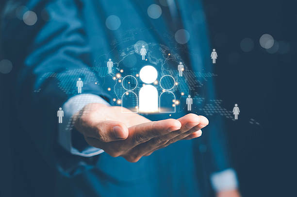 istock Know your customer (KYC) concept, Target customer, Magnifier glass focus to manager icon which is among staff icons for human development recruitment leadership and customer target group concept. 2246250628