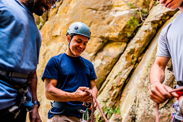 istock Friends climber talking during mountain climber day outdoors 2246250794