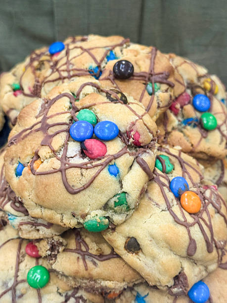 Image of chunky chocolate chip cookies sugar-coated rainbow candy sweets sweet, colorful dessert treats, indulgent baked goods