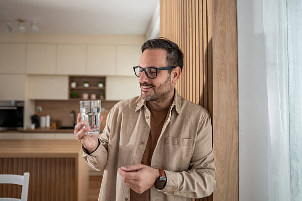 istock Man enjoying refreshing water for hydration and wellness 2246251639