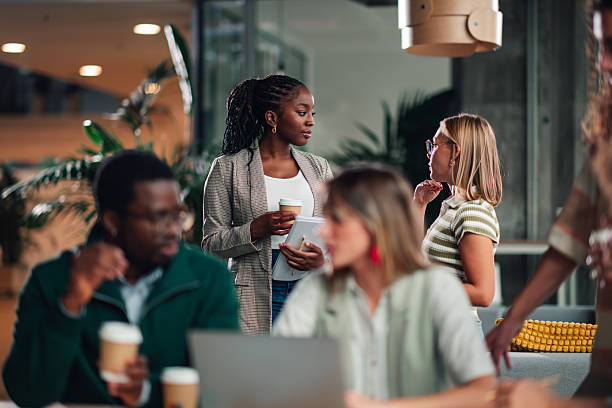istock Diverse business people discussing during office coffee break 2246251662