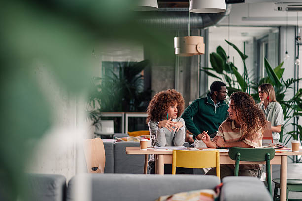 istock Diverse business team collaborating in modern office meeting 2246251764